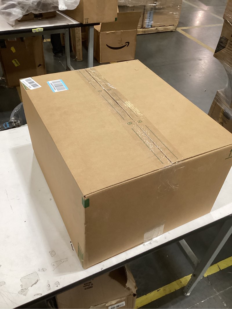 Condition photo showing Good Condition for this item appears to be a large laundry or dry cleaning bag containing a bulky textile product, similar to those used by services such as rinse.  