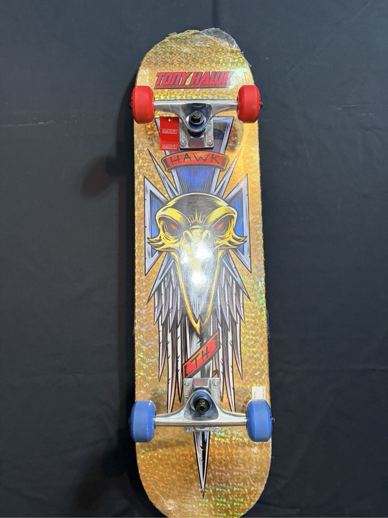 Tony Hawk Signiture Series 31” Metallic Gold Skateboard/Dagger /level