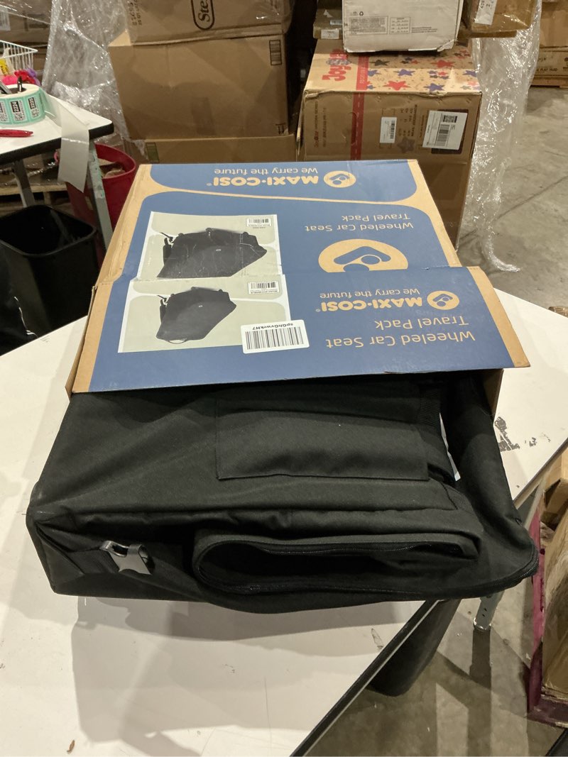 Condition photo showing New/Like New for maxi-cosi wheeled car seat travel pack, black black travel bag