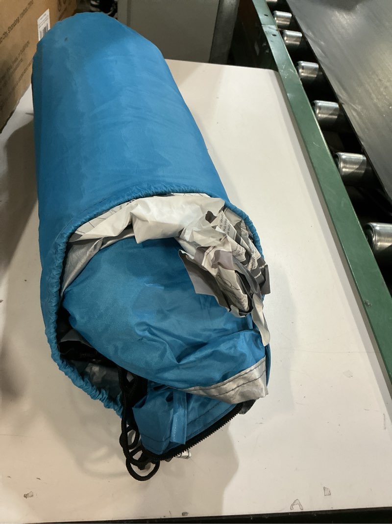 Condition photo showing As Is for OutdoorMaster Beach Tent Sun Shelter for 3-4 Person, Pop Up Beach Tent Easy Setup with Sandbags, Portable Sun Shade Canopy with Carrying Bag for Beach & Outdoor, UPF50+ UV Protection, Family Size Blue X-Large