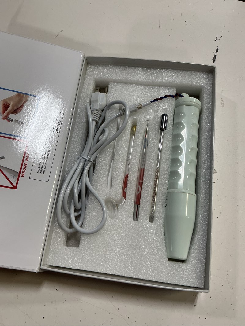 Condition photo showing As Is for pure daily care nuderma handheld high-frequency wand kit features a white wand with a textured handle for anti-aging and skin clarification (missing part)