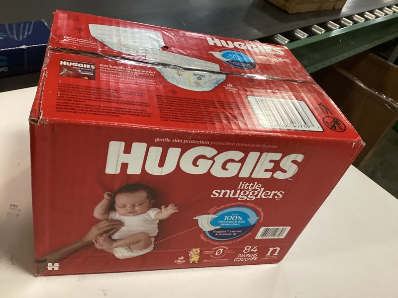 Condition photo showing New/Like New for Huggies Size Newborn Diapers, Little Snugglers Baby Diapers, Size Newborn (up to 10 lbs), 84 Count, Packaging May Vary Newborn 84