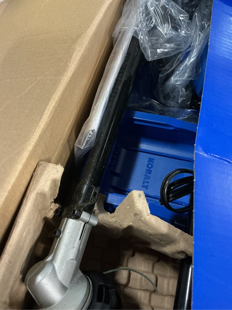 Condition photo showing As Is for kobalt gen4 40-volt 15-in straight shaft attachment capable battery string trimmer 4 ah (battery and charger included)