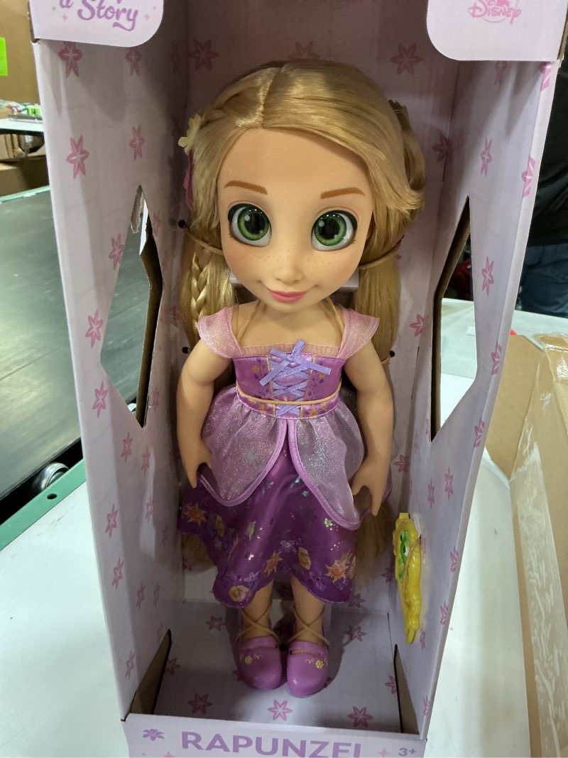 Condition photo showing New/Like New for Disney Store Official Rapunzel Once Upon a Story Doll - 16 Inch Disney Princess Toys Featuring Reflective Eyes with 3D Pupil and Iris, Detailed Costume, Hair Comb & Shoes - Comes in Display Box