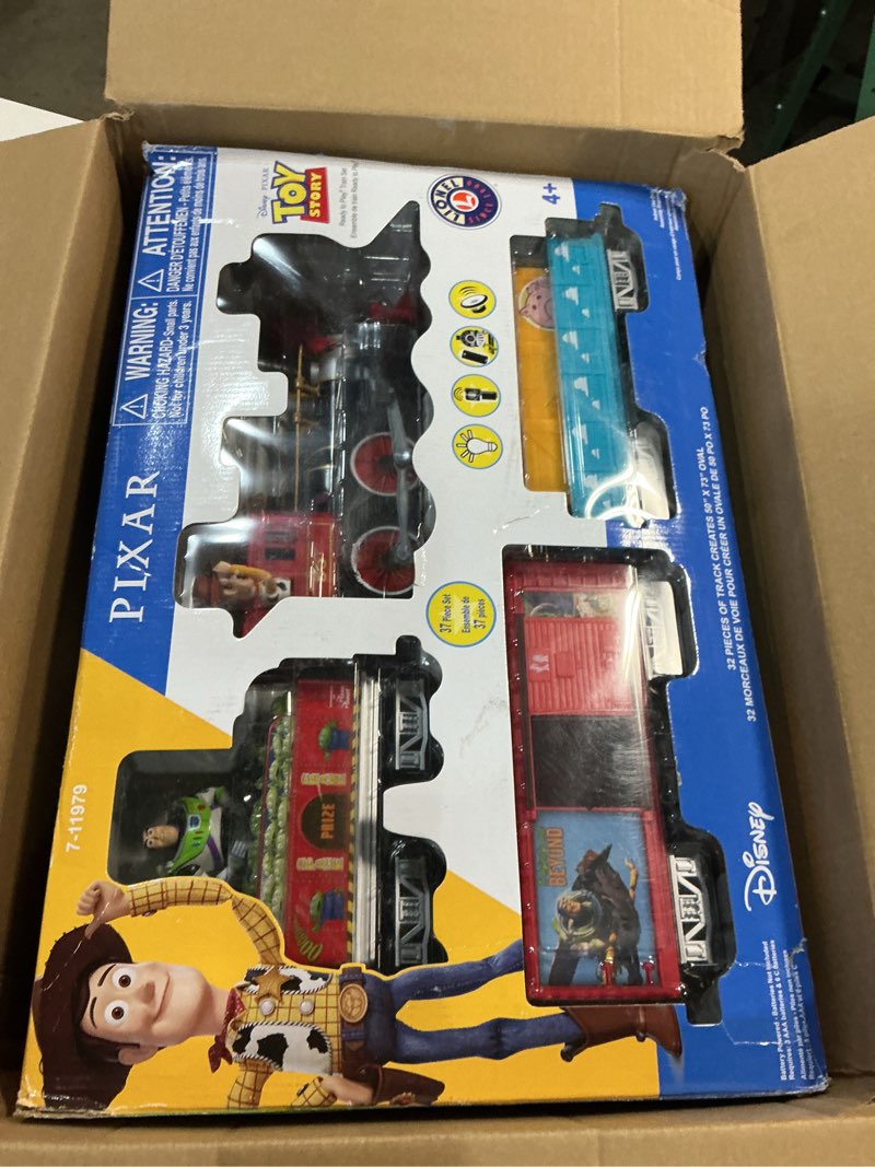 Condition photo showing New/Like New for Lionel Battery-Operated Disney Toy Story Toy Train Set with Locomotive, Train Cars, Track & Remote with Authentic Train Sounds, & Lights for Kids 4+ Ready-to-Play