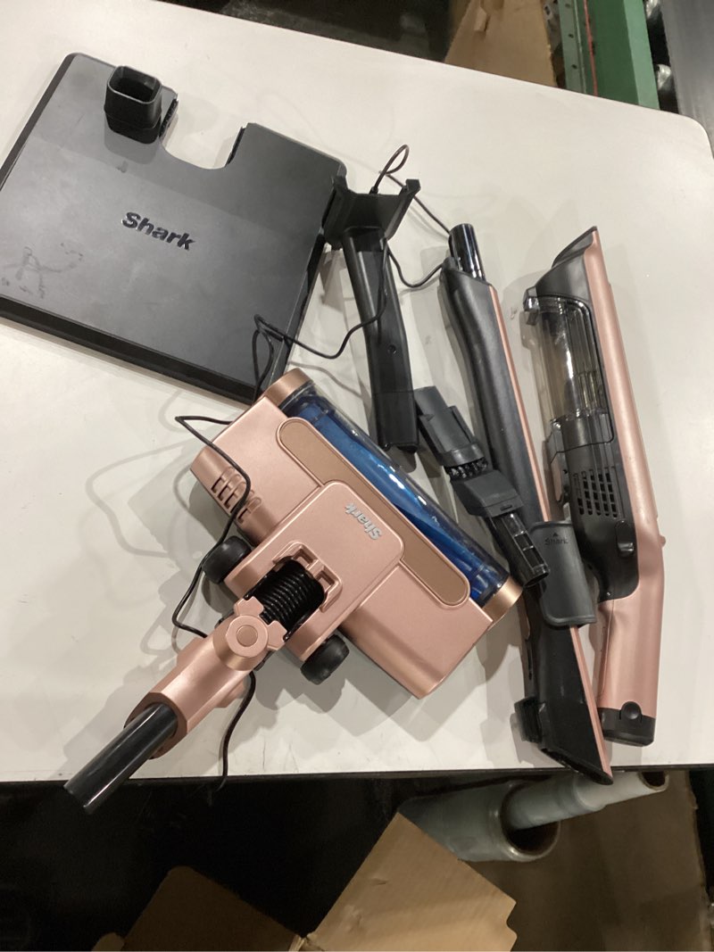 Condition photo showing As Is for *Not Tested* Shark WS642RG WANDVAC System Pet 3-in-1 Ultra-Lightweight Powerful Cordless Stick & Handheld Vacuum Combo with Charging Dock, Duster Crevice Tool & Pet Multi-Tool, Rose Gold Rose Gold without HEPA Empty Base