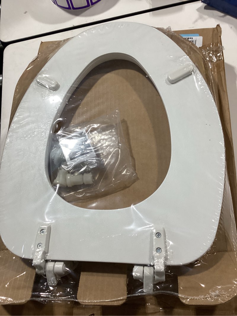 Condition photo showing New/Like New for mayfair padded toilet seat, cushioned soft vinyl over wood core seat, secure hinges, easy clean, made in usa, elongated, white elongated white toilet seat