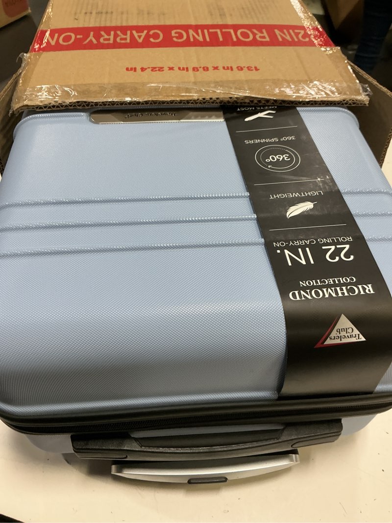 Condition photo showing Good Condition for travelers club 22" richmond spinner carry-on luggage, blue