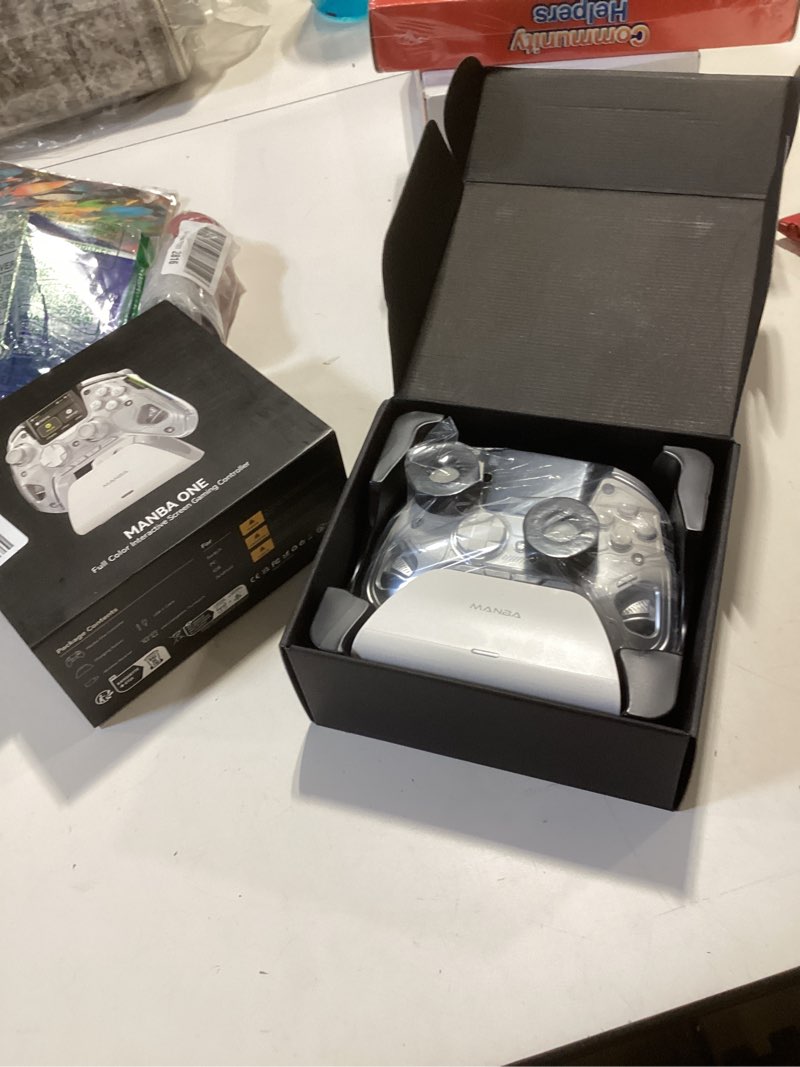Condition photo showing New/Like New for manbaone interactive screen wireless gaming controller for pc/switch/switch 2/ios/android,hall effect stick & trigger,rgb lighting,remappable buttons,1800mah with charging dock (white)