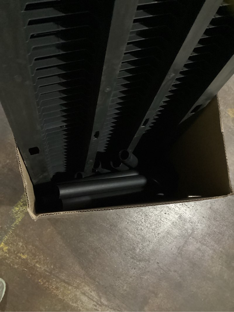 Condition photo showing As Is for unknown size possibly incomplete .. project source 5 -tier heavy duty black plastic utility shelving uni