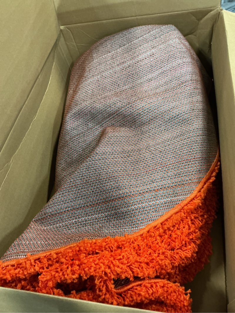 Condition photo showing As Is for Unique Loom Solid Shag Collection Area Rug (6' 1" Round, Tiger Orange)