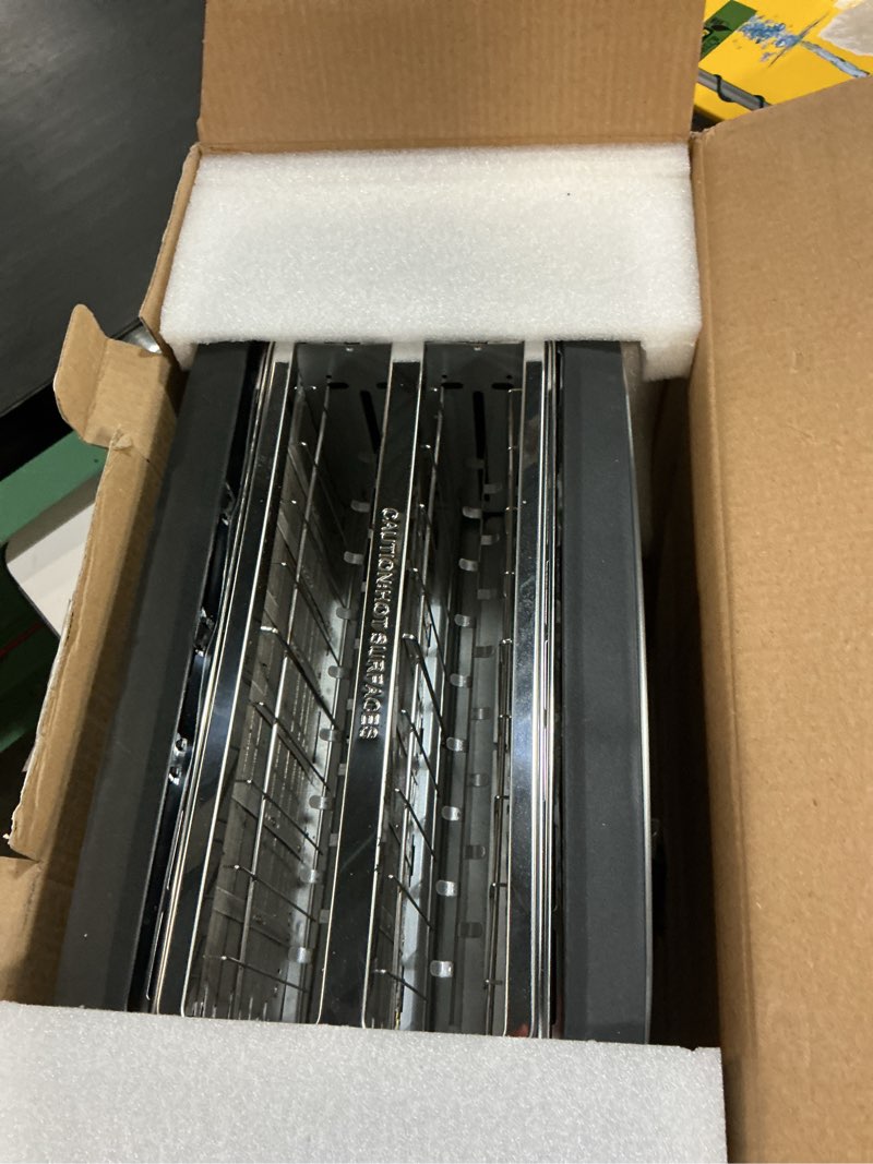 Condition photo showing Good Condition for toaster 4 slice with countdown timer, extra wide slots for bagels and waffles, 6 browning settings, removable crumb tray, stainless steel stainless steels 4 slice