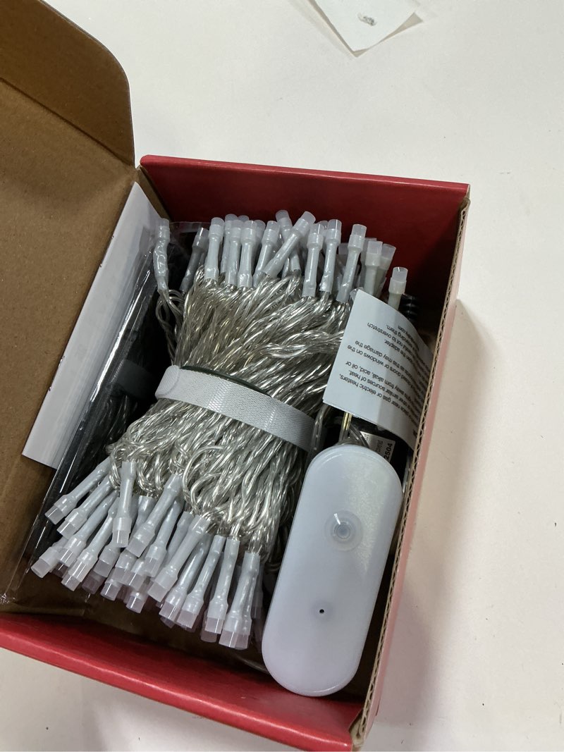 Condition photo showing Good Condition for Ollny Smart Christmas Lights, 66FT 200 LEDs APP Control RGB Color Changing Christmas Tree Lights with Remote, Programmable DIY Musical Waterproof Decor Light with Timer for House Indoor Outdoor House Clear Wire 200LED