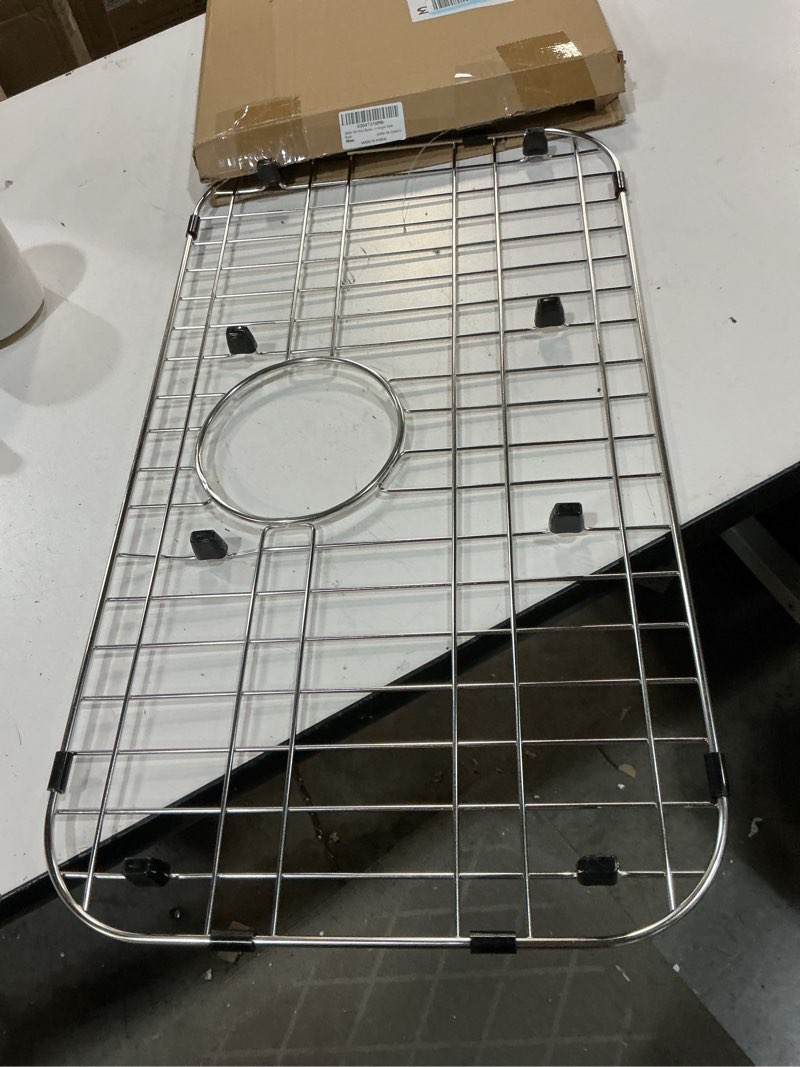 Condition photo showing Good Condition for ipegtop sink bottom grid, 23"x 13" stainless steel sink protector with rear drain corner radius 2", sink grate for bottom of kitchen single sink bowl, one-piece 23"x 13", rear drain