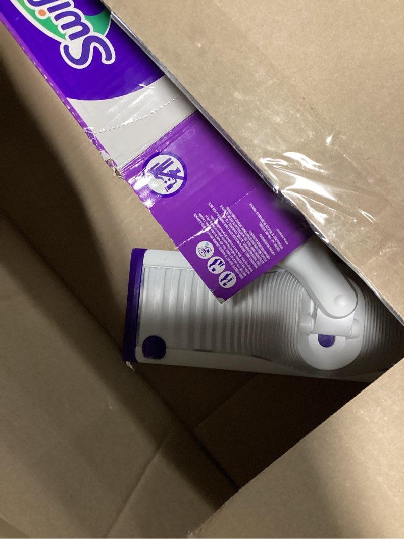 Condition photo showing As Is for swiffer powermop multi-surface mop kit for floor cleaning, includes powermop, 2 mopping pad refills, 1 cleaning solution with fresh scent and 2 batteries purple and white
