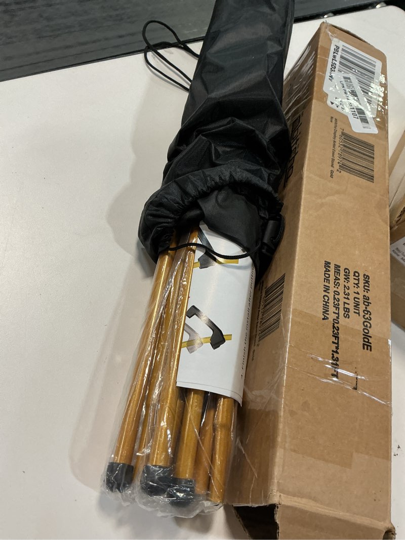 Condition photo showing New/Like New for Display Artist Easel Stand - 63" Instant Tripod Collapsible Portable Floor Easel - Easy Folding Adjustable Art Poster Metal Stand for Display Show, Wedding, Painting - Gold