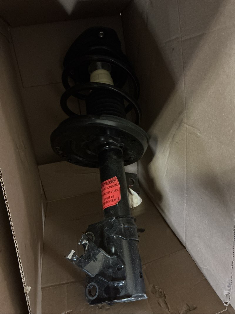 Condition photo showing As Is for monroe quick-strut 172949 suspension strut and coil spring assembly for chevrolet traverse