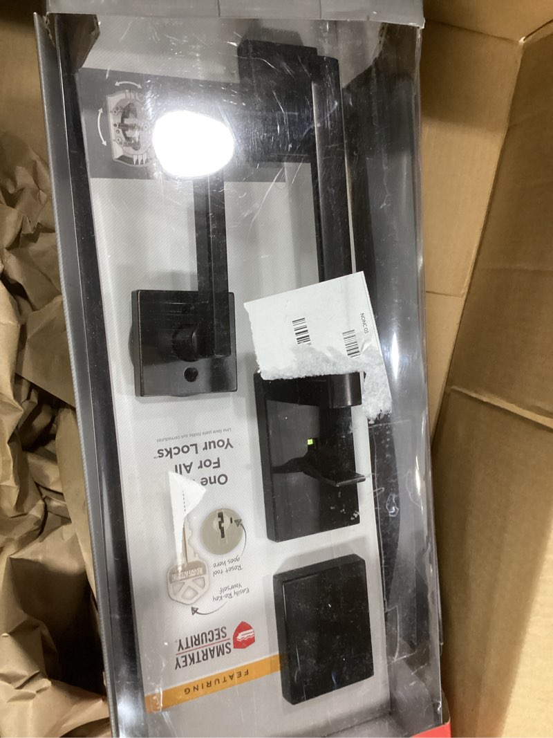 Condition photo showing As Is for Kwikset San Clemente Front Door Lock Handle and Deadbolt Set, Entry Handleset Exterior with Interior Reversible Lever, Venetian Bronze, Pick Resistant SmartKey Rekey Deadbolt Security Venetian Bronze With Handle Keyed Entry