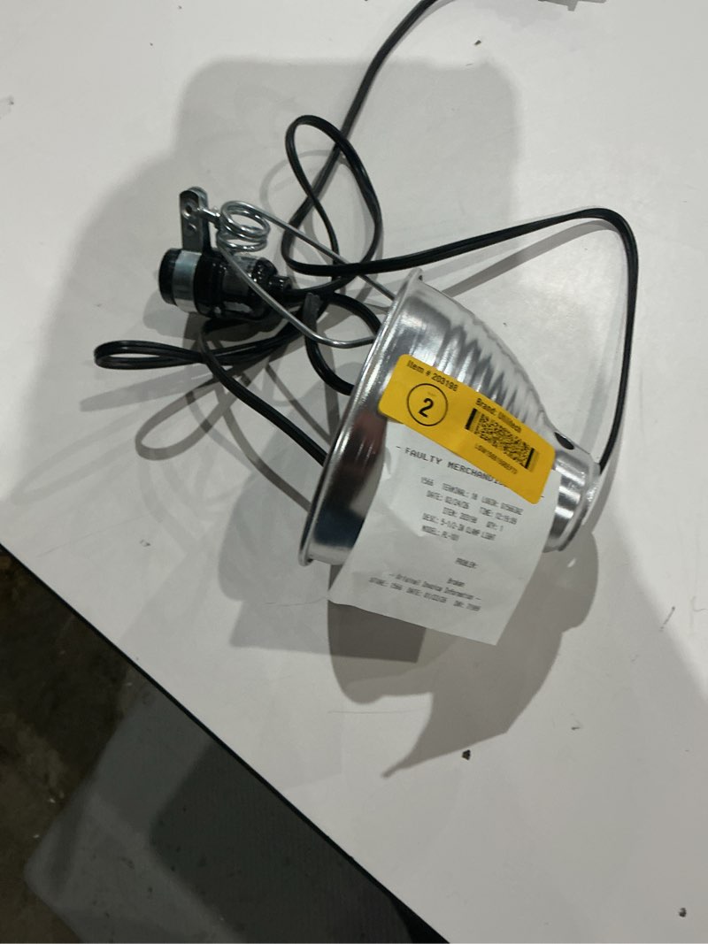 Condition photo showing As Is for utilitech 700 -lumens incandescent plug-in clamped work light
