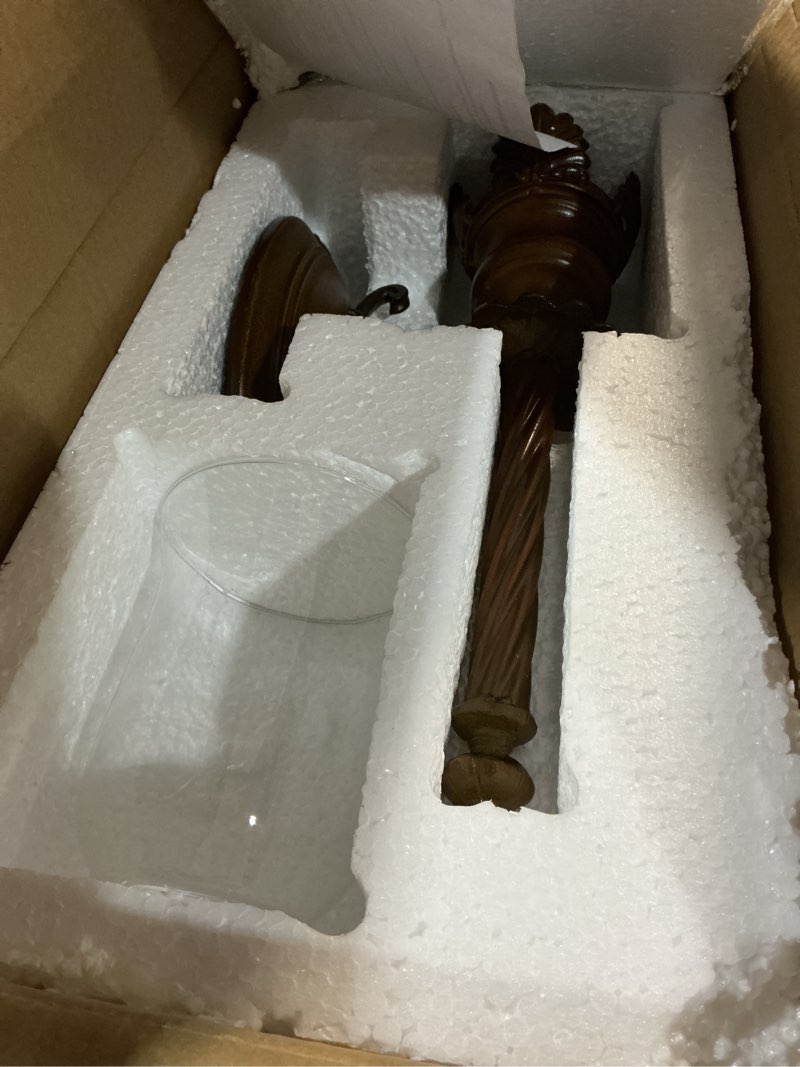 Condition photo showing Good Condition for 18 in. brown glass single candle wall sconce