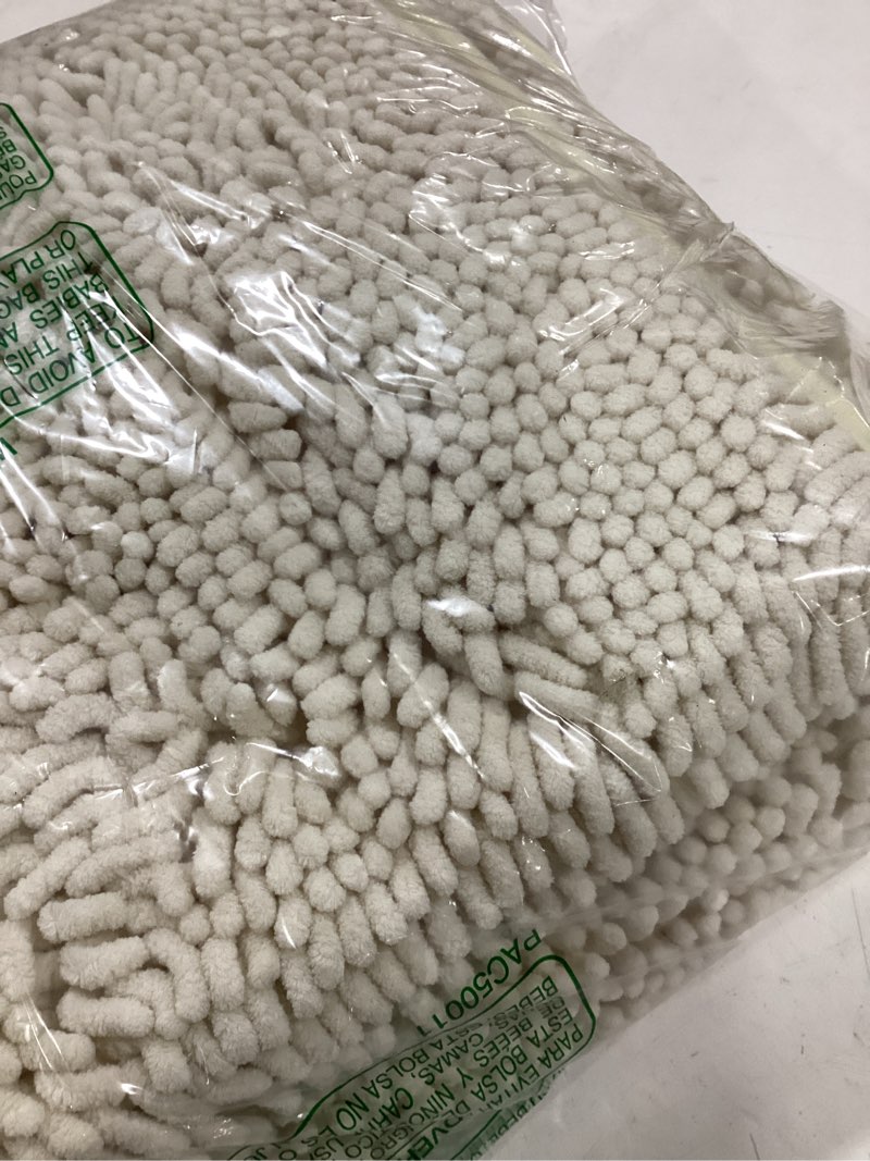 Condition photo showing Good Condition for OLANLY Bathroom Rugs 59x20, Extra Soft Absorbent Chenille Bath Rugs, Rubber Backing Quick Dry, Machine Washable Bath Mats for Bathroom Floor, Tub and Shower, Home Decor Accessories, Beige 59" x 20" Beige
