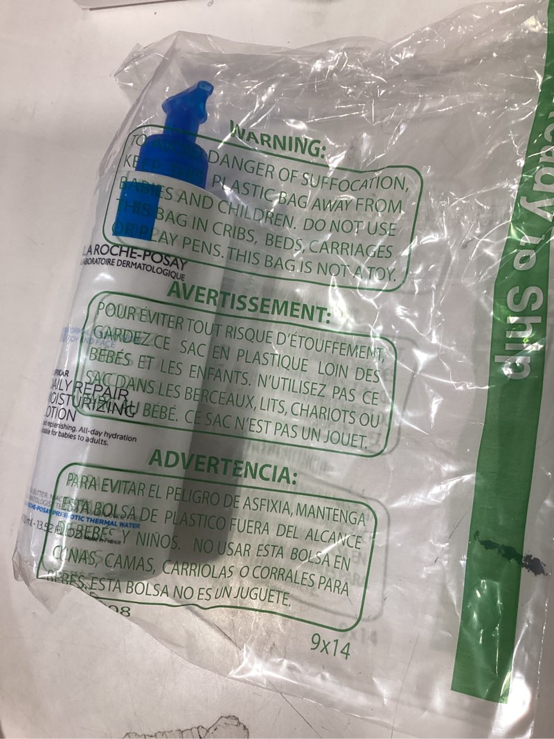 Condition photo showing As Is for La Roche-Posay Lipikar Body Lotion Daily Repair Moisturizing Cream, Fragrance Free Body Moisturizer with Shea Butter, Body Lotion for Dry Skin, Moisturizing for Sensitive Skin