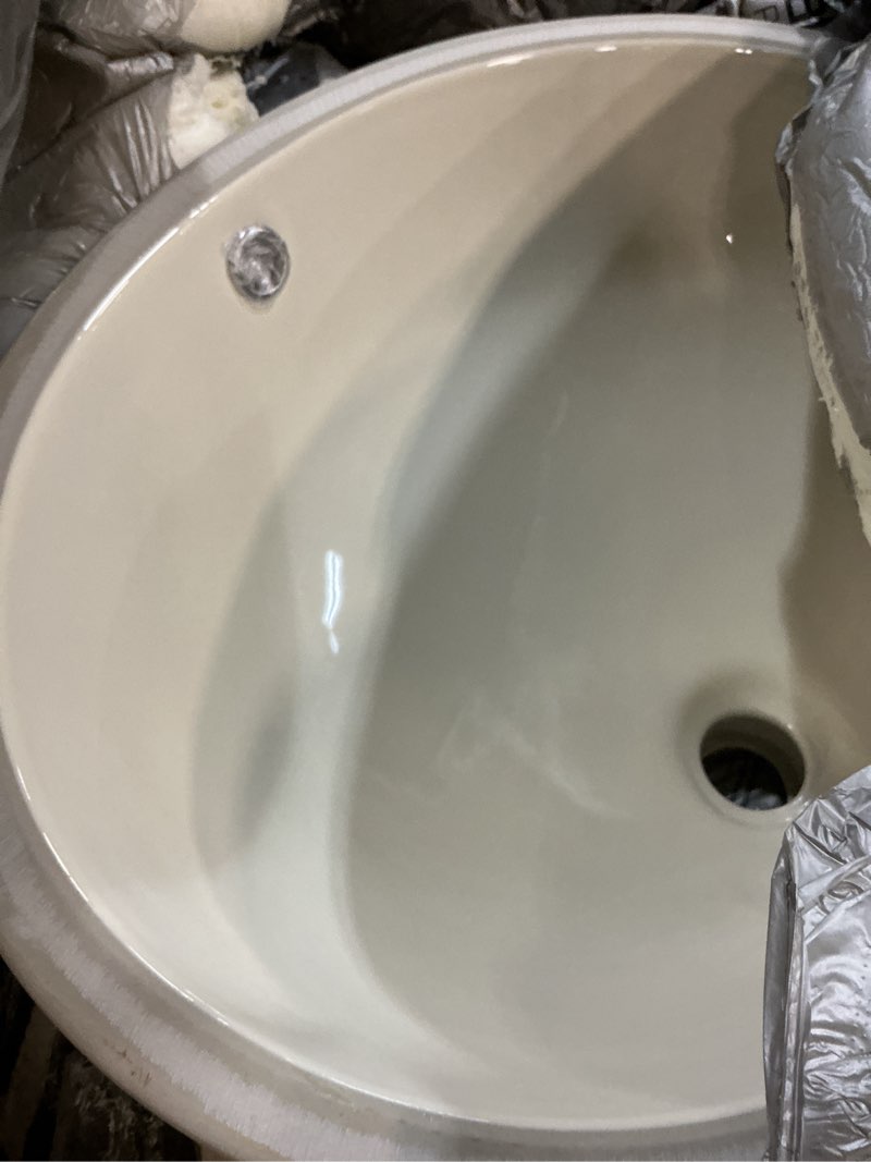 Condition photo showing Good Condition for msi 17.0” (l) x 14.125” (w) x 7.75” (h) oval porcelain ceramic undermount bathroom vanity vessel sink, bisque 17”x14”