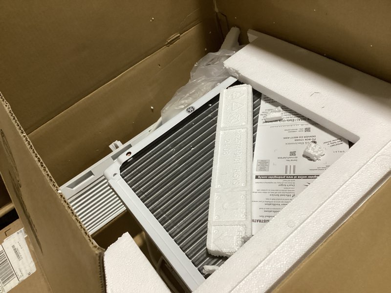 Condition photo showing As Is for lg 8,000 window air conditioner, 115v, 350 sq.ft. (14' x 25' room size), quiet operation, electronic control with remote, 3 cooling & fan speeds, auto restart, 8000 btu, white 1 count (pack of 1) cool only 115v white