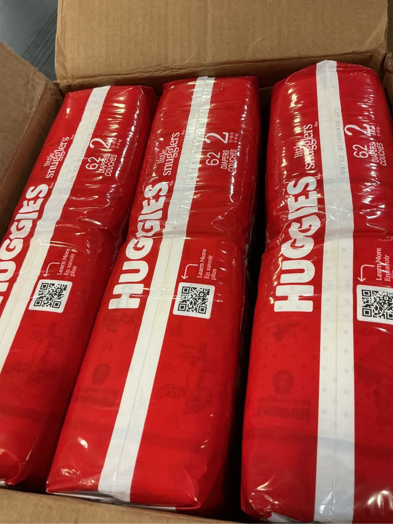 Condition photo showing New/Like New for huggies size 2 diapers, little snugglers baby diapers, size 2 (12-18 lbs), 186 count (3 packs of 62), packaging may vary