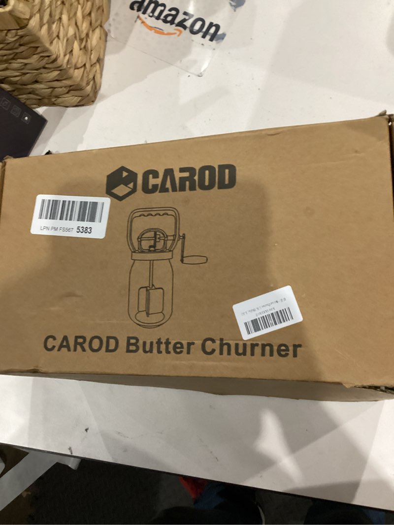 Condition photo showing Good Condition for CAROD Classical Butter Churner, 1.5L Glass Jar with Hand Injury Prevention Device & Sifting Lid, 50oz Hand Crank Jar Maker Creates Fresh Homemade Butter within 15 Min, Ideal DIY Kitchen Gift White 1.5L
