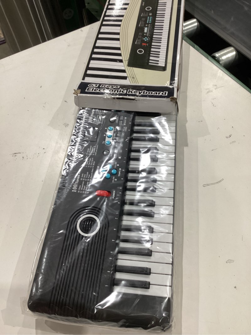 Condition photo showing Good Condition for 61 key keyboard piano, portable electronic digital piano, built in dual speakers, external microphone, power plug, rich teaching content, multi-functional electronic piano suitable for beginners