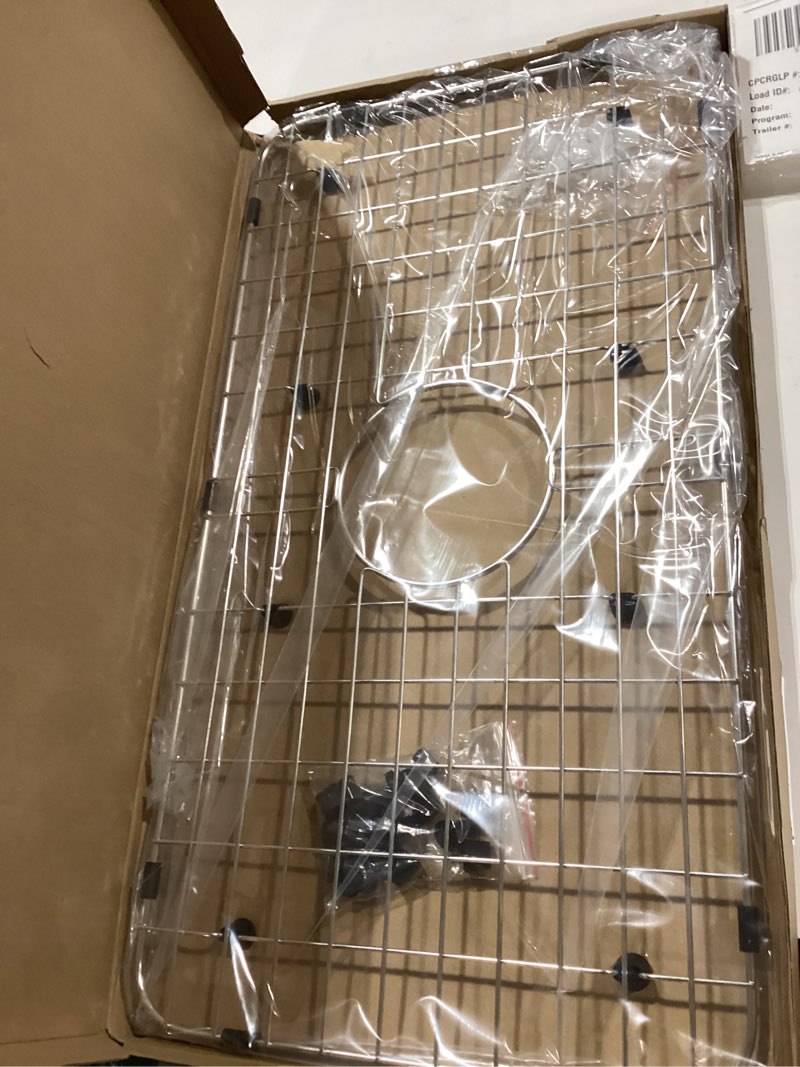 Condition photo showing Good Condition for serene valley sink bottom grid 24-1/8" x 12-5/8", centered drain with corner radius 1-1/2", sink protector nlw2412c