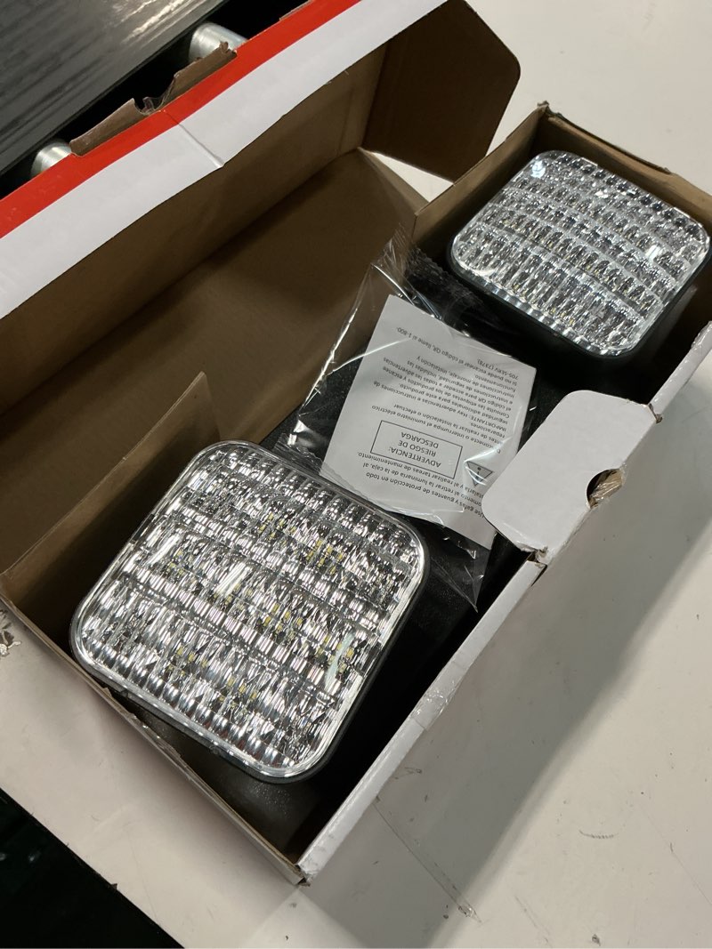 Condition photo showing As Is for contractor select eu2c 120-277-volt integrated led black emergency light fixture with battery