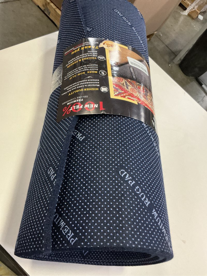Condition photo showing As Is for DELLUNA Non-Slip Area Rug Pad 2'x6', 3/8" Thick Double Side Rubber + Felt, Premium Deluxe Cushioned- Safe for All Floors, Adds Comfort and Protection, Ultra Strong Grip, Stop Rug from Moving. 2' x 6' (Rectangular) 3/8 Inch Dual Surface Rug Pad