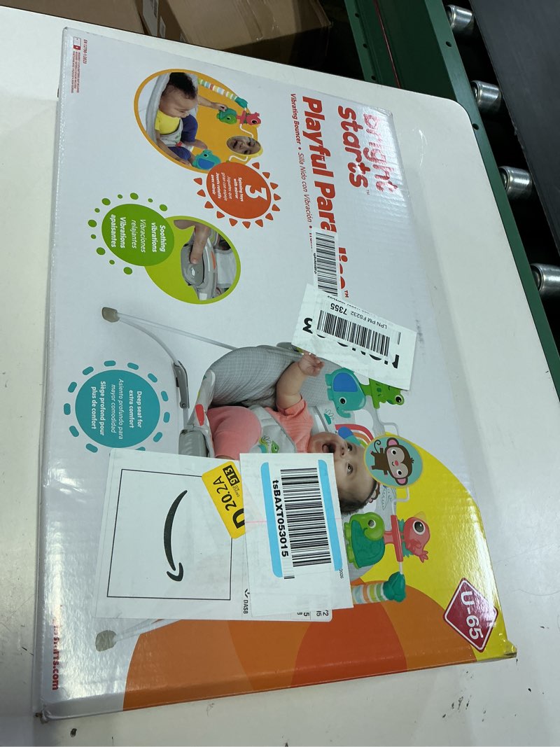 Condition photo showing New/Like New for bright starts playful paradise comfy baby bouncer seat with soothing vibration and toys, unisex, 0-6 months
