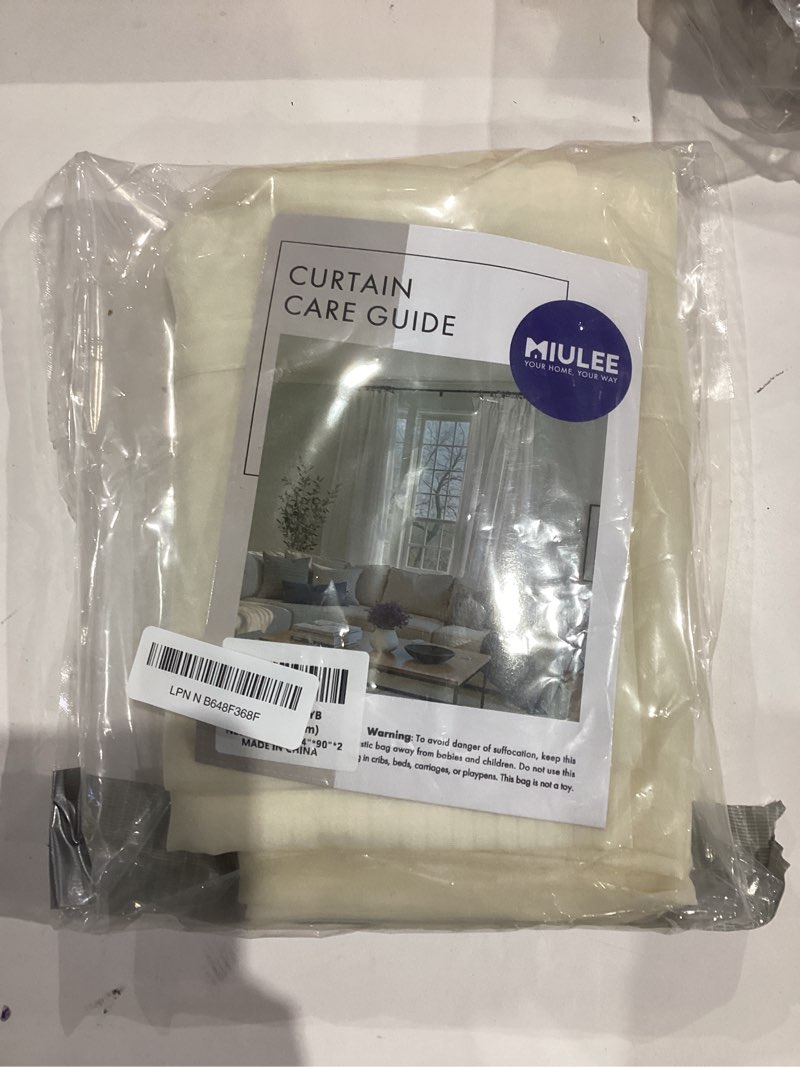 Condition photo showing Good Condition for miulee 2 panels solid color sheer window curtains elegant window voile panels/drapes/treatment for bedroom living room (54x90 inches cream) cream solid 54"w x 90"l (pack of 2)