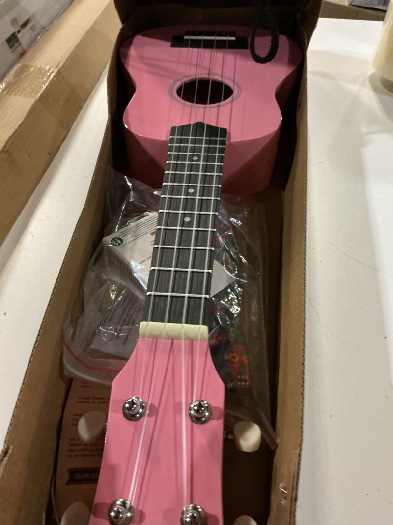 Condition photo showing Good Condition for donner soprano ukulele for beginners 21 inch ukelele starter bundle kit with free online lessons bag strap string tuner picks cloth ukalalee yukalalee (pink) pink rainbow 21 inch