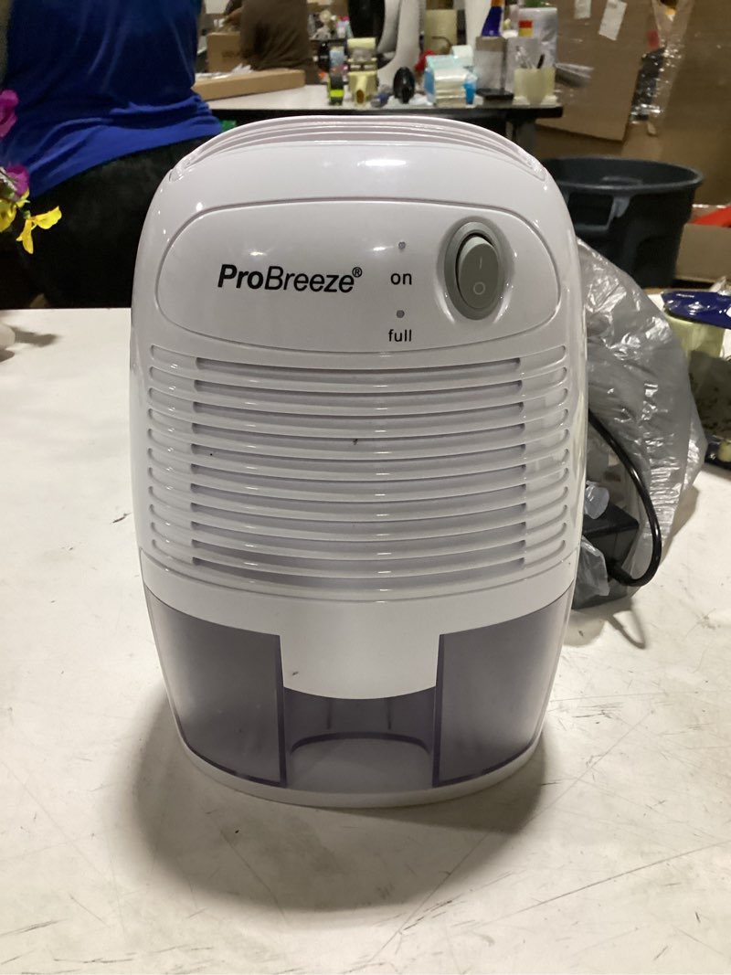 Condition photo showing As Is for pro breeze mini portable dehumidifier, 17oz ultra quiet compact peltier dehumidifier, 215 sqft 1pack