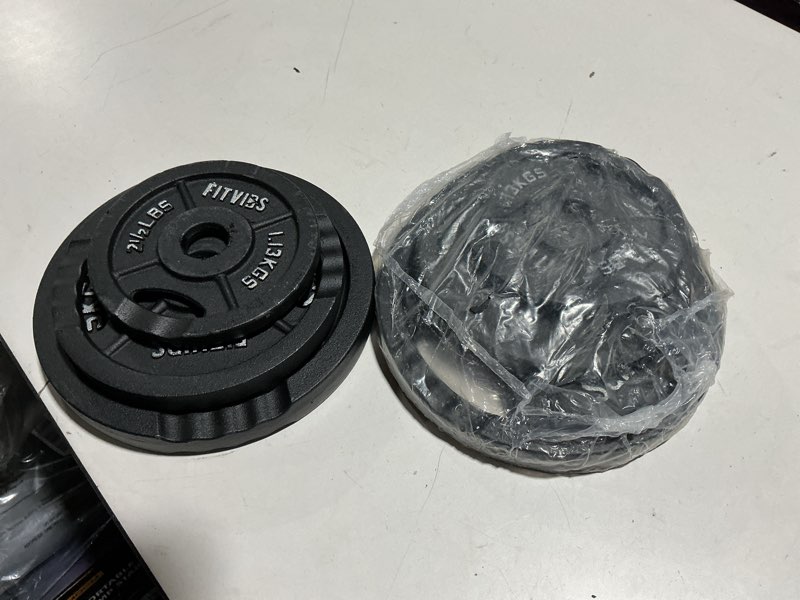 Condition photo showing Good Condition for fitvids olympic 2-inch cast iron plate weight plate for strength training and weightlifting, two hole style, 35lb set