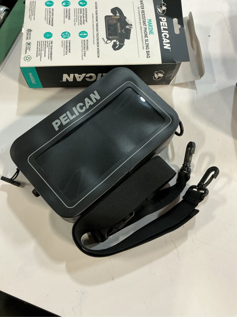 Condition photo showing Good Condition for pelican marine waterproof sling bag - crossbody chest/shoulder bag for men with adjustable strap & touchscreen compatible phone compartment - travel daypack for camping, hiking, biking & more