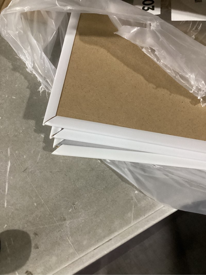 Condition photo showing Good Condition for upsimples 16x24 Picture Frame White 3 Pack, Scratch-Proof Poster Frames 16 x 24 for Photo Gallery - Slide-In Strips, Horizontal or Vertical Wall Mounting White 16x24