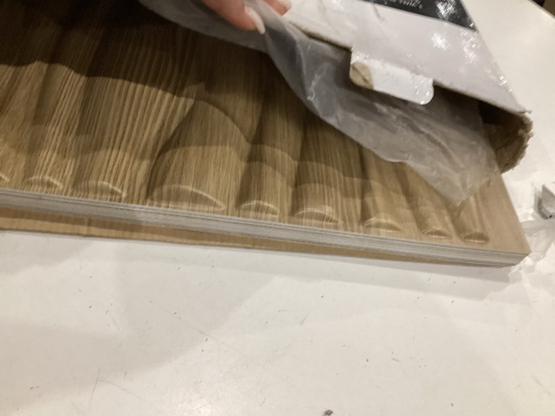 Condition photo showing Good Condition for art3d pvc wave board textured 3d wall panels for interior wall decor, living room, bedroom, office, walnut, 19.7" x 19.7" (12 pack)