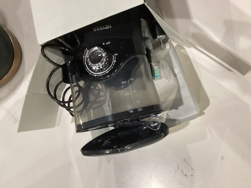 Condition photo showing As Is for water flosser & ultrasonic electric toothbrush combo, 600ml water dental flosser with 7 jet tips, 10 adjustable water pressure, 5 toothbrush heads for home use, gums, braces black