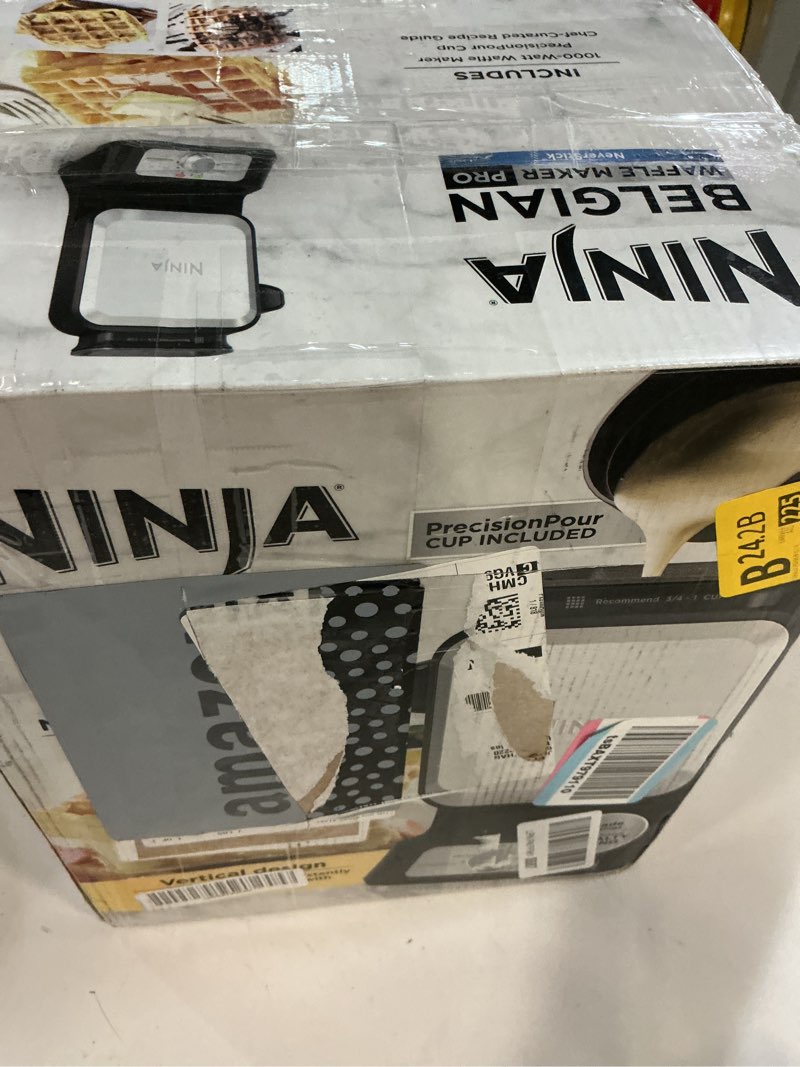 Condition photo showing As Is for Ninja BW1001 NeverStick PRO Belgian Waffle Maker, Vertical Design, 5 Shade Settings, with Precision-Pour Cup & Chef-curated Recipe Guide, Black & Silver