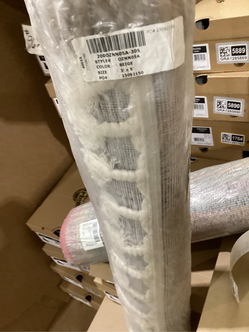 Condition photo showing New/Like New for Oznn05a beige 3’x5’ 