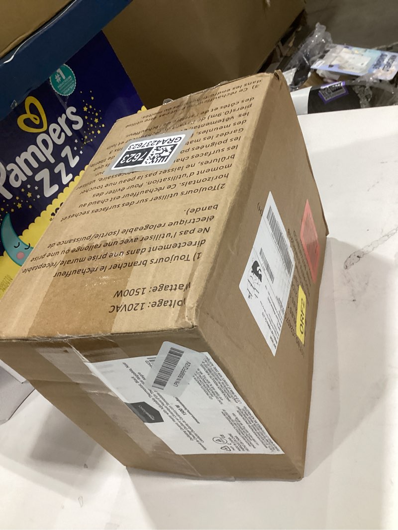 Condition photo showing New/Like New for Amazon Basics Oscillating Ceramic Space Heater, Portable Indoor Heating Solution, With Overheat and Tip-Over Protection, Thermostat, 1500W, 7.52"D x 6.34"W x 9.45"H, Black Oscillating black