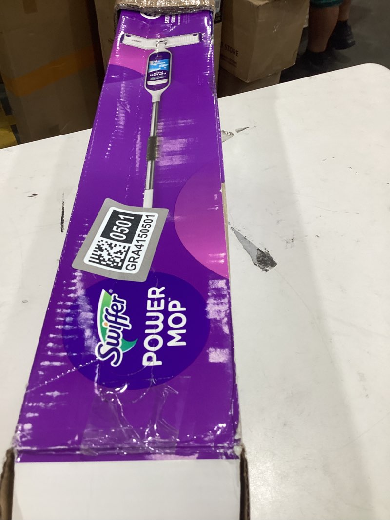 Condition photo showing As Is for swiffer powermop multi-surface mop kit for floor cleaning, fresh scent, mopping kit includes powermop, 2 mopping pad refills, 1 floor cleaning solution with fresh scent and 2 batteries purple and white