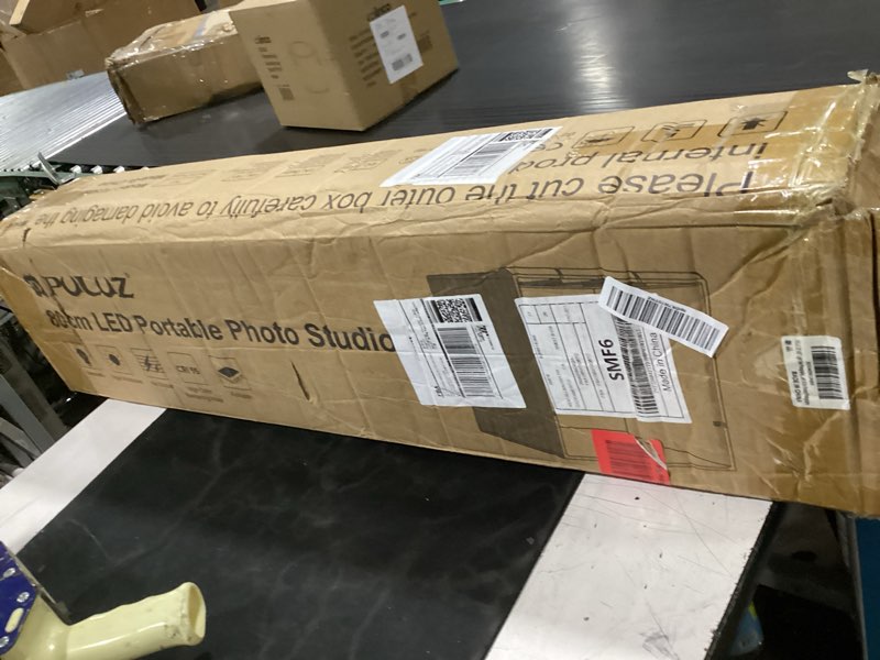 Condition photo showing As Is for (missing box) puluz 32\"x32\" light box photography, large photo light box with 3 stepless dimming light panel, 234 led beads, professional photo booth shooting tent kit with 4 color backdrops for product photography