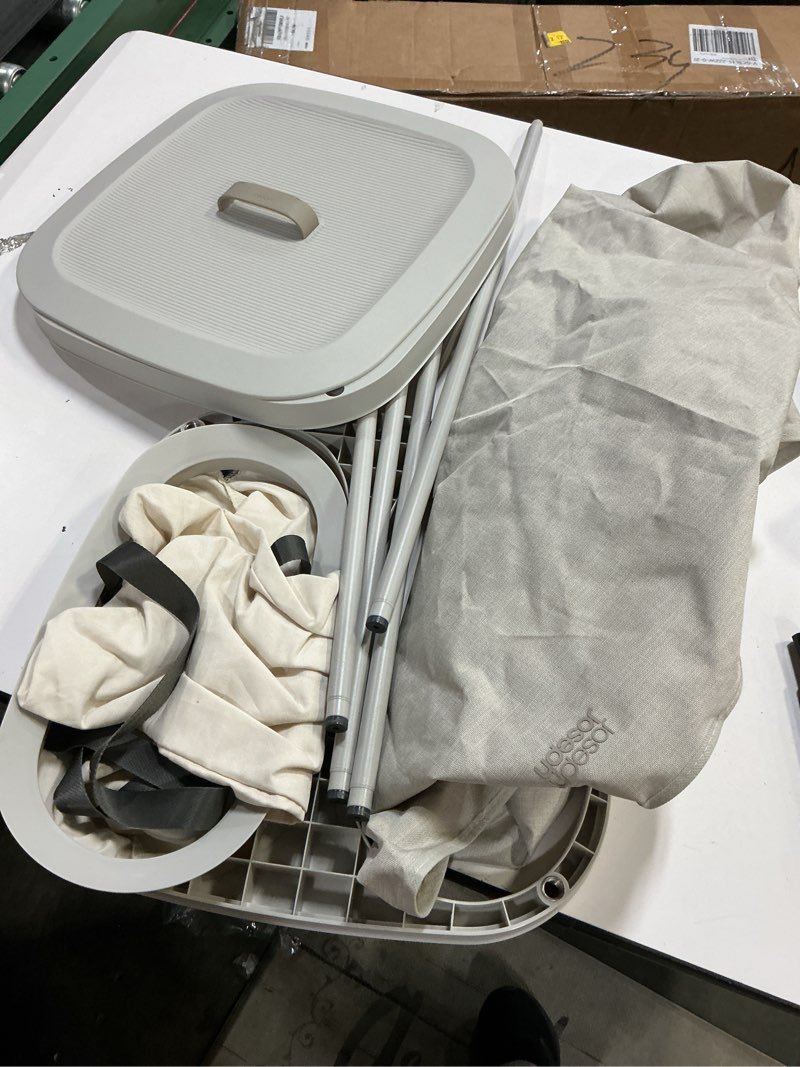 Condition photo showing As Is for Joseph Joseph Tota 90 liter/23.8 gallon Laundry Hamper Separation Basket with lid, 2 Removable Washing Bags with Handles - Ecru Dual Ecru 90L