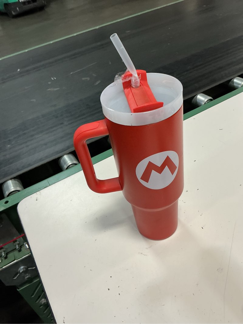 Condition photo showing As Is for super mario mario stainless steel tumbler